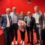 Due momenti della presentazione tenuta nell'auditorium di Roreto. Insieme a Cristina Ghiringhello si riconoscono il direttore generale Marco Carelli, il vice direttore Danilo Rivoira e i promotori del progetto sulla gentilezza: Gianluca Lingua e Piercarlo Gentile, rispettivamente responsabili di Area Commerciale e Risk Management dell'istituto di credito cheraschese